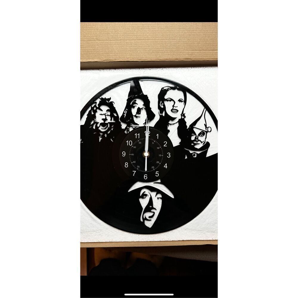 The Wizard of Oz 12”Black Lp wall clock . Battery  operated .
